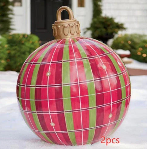 Inflatable Christmas baubles in various festive designs for outdoor holiday decoration