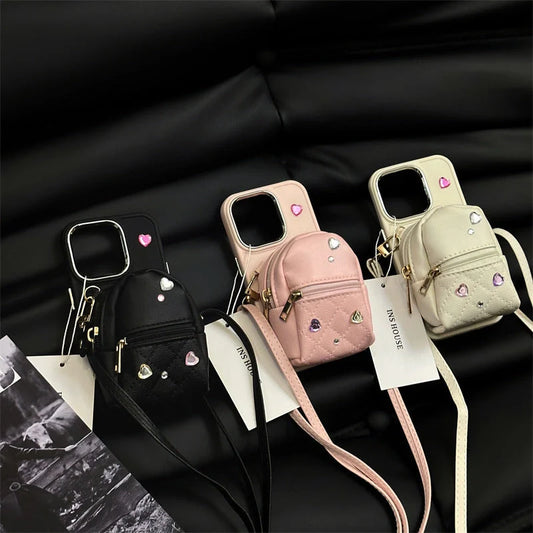 Crossbody wallet phone case for ApplePhone in white, black, or pink with removable shoulder strap