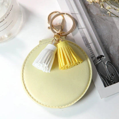 Mini round PU leather small mirror with lovely tassel in various colours