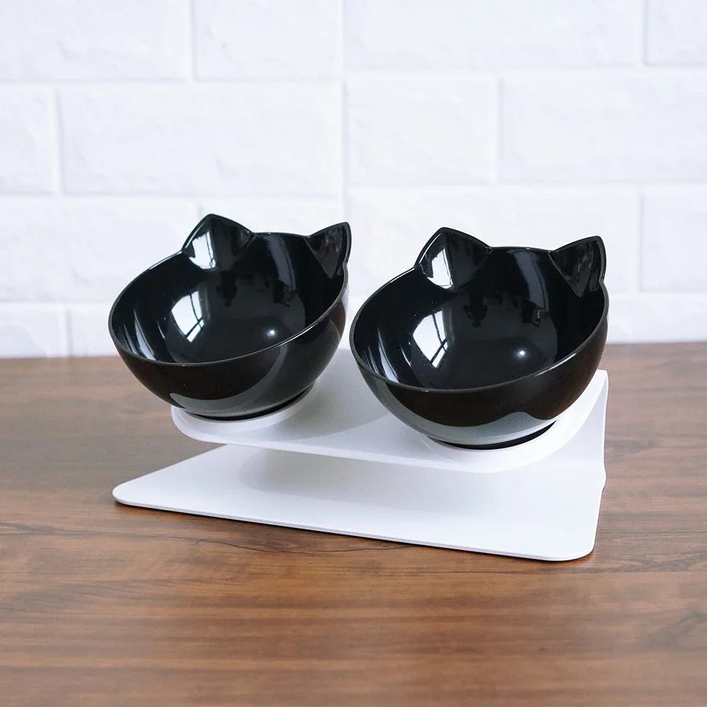 Elevated tilted pet bowl with non-slip stand in transparent, white, and black color options