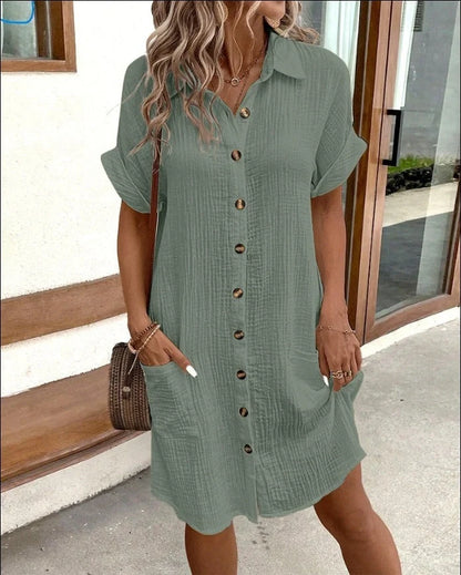 Stylish midi dress with short sleeves, made of premium polyester fabric and available in a range of colours