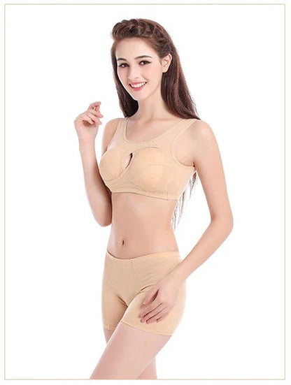 Supportive cotton sports bra with crossover design for lift and support, preventing sagging and bra lines