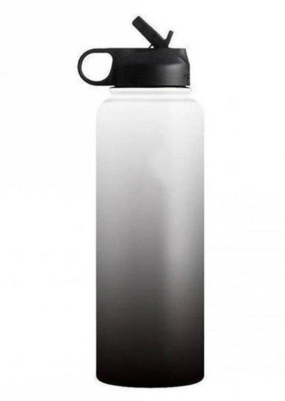 Premium stainless steel insulated tumbler with push-button lid and sleek design for outdoor adventures and active lifestyles.