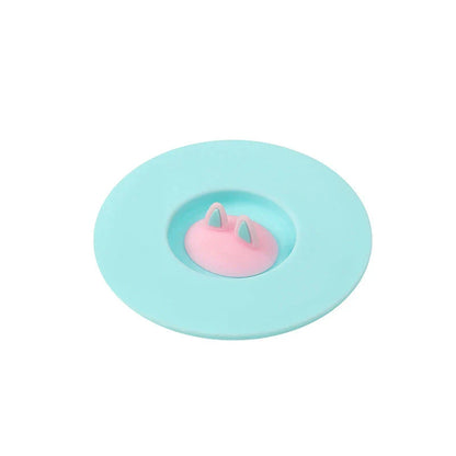 Spill-Proof Cat Ear Silicone Drink Lid in various colors, including pink, orange, and blue