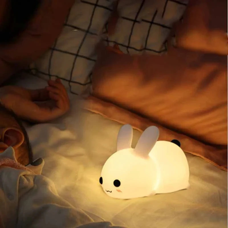 Soft, rabbit-shaped silicone LED night light with dimmable, dual-tone lighting for UK children's bedrooms