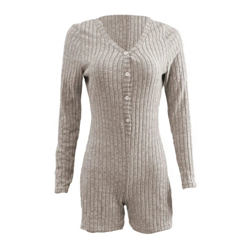 Elegant rib-knit jumpsuit in various colours, featuring a relaxed waistline and tapered legs for a sleek, flattering silhouette