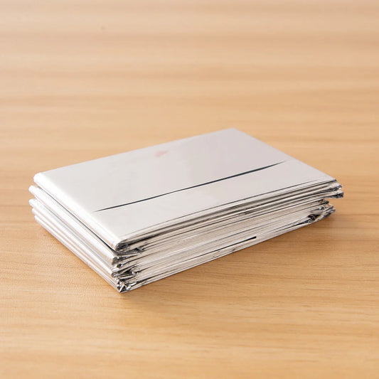 Double-sided silver and gold emergency survival blanket for outdoor use