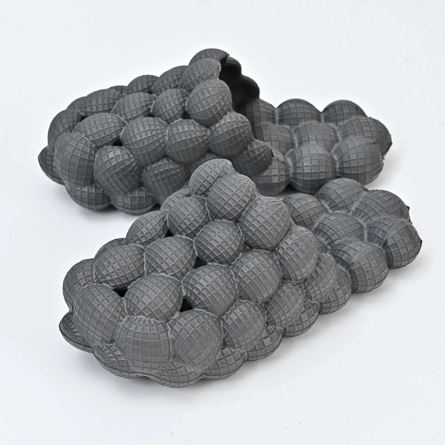 Comfortable massage bubble slides with breathable mesh upper and non-slip soles for indoor relaxation and pampering