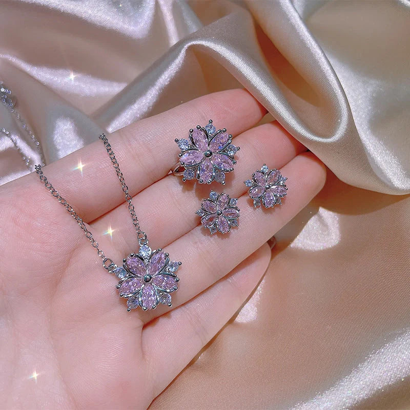 Exquisite zircon jewellery set with double-layered flower design and shimmering cubic zirconia stones