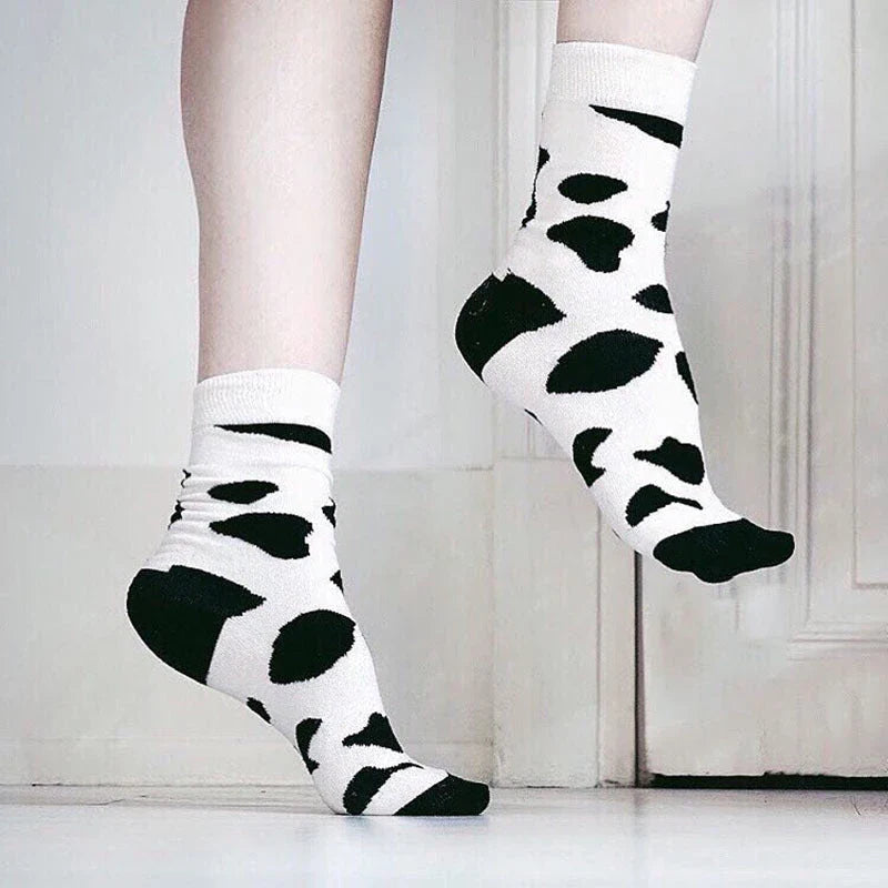 Stylish Dalmatian-inspired cotton crew socks with a premium blend of polyester, spandex, and cotton for all-day comfort and flexibility.