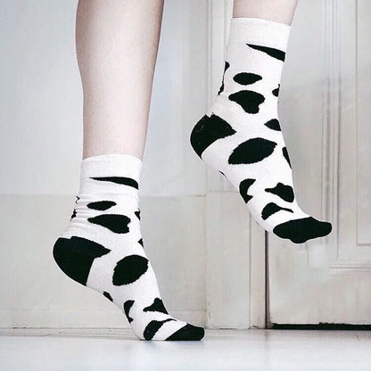 Stylish Dalmatian-inspired cotton crew socks with a premium blend of polyester, spandex, and cotton for all-day comfort and flexibility.