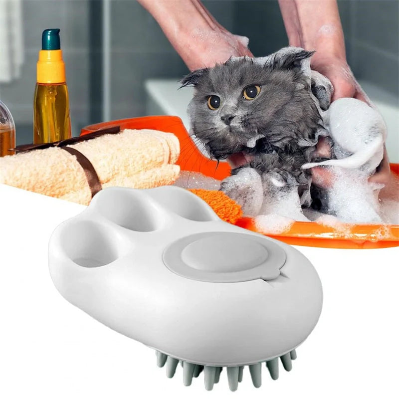Claw-shaped pet grooming brush in pink, blue, yellow, and grey