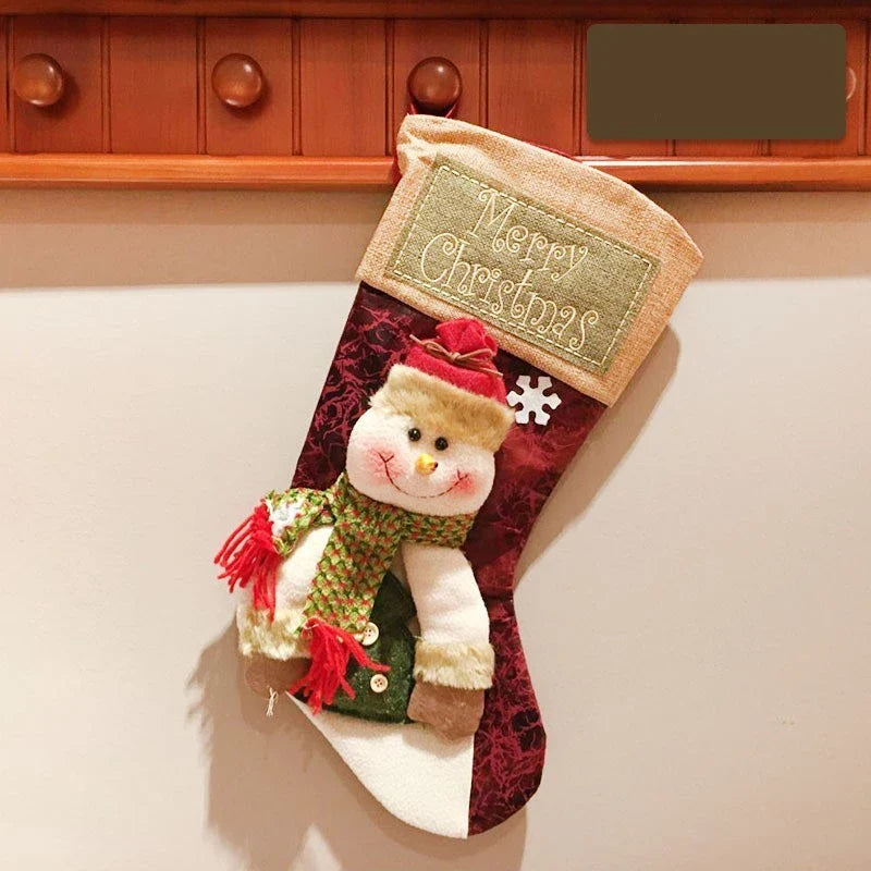 Festive Christmas stockings with 3D appliqués of snowmen, Santa Claus, and elk