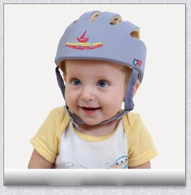 Heavy-duty baby flat head protector helmet in various colours, featuring breathable cotton material, adjustable straps, and shock-absorbing cushions for ultimate safety and comfort.