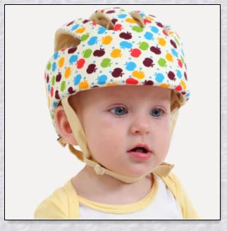 Heavy-duty baby flat head protector helmet in various colours, featuring breathable cotton material, adjustable straps, and shock-absorbing cushions for ultimate safety and comfort.
