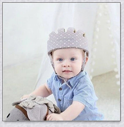 Heavy-duty baby flat head protector helmet in various colours, featuring breathable cotton material, adjustable straps, and shock-absorbing cushions for ultimate safety and comfort.