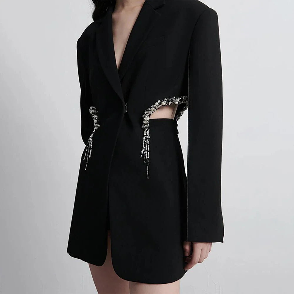 Elegant Hollow Out Crystal-Embellished Women's Blazer in Black, featuring a sleek notched collar, hidden breasted closure, and intricate hollow-out splicing with crystal embellishments.