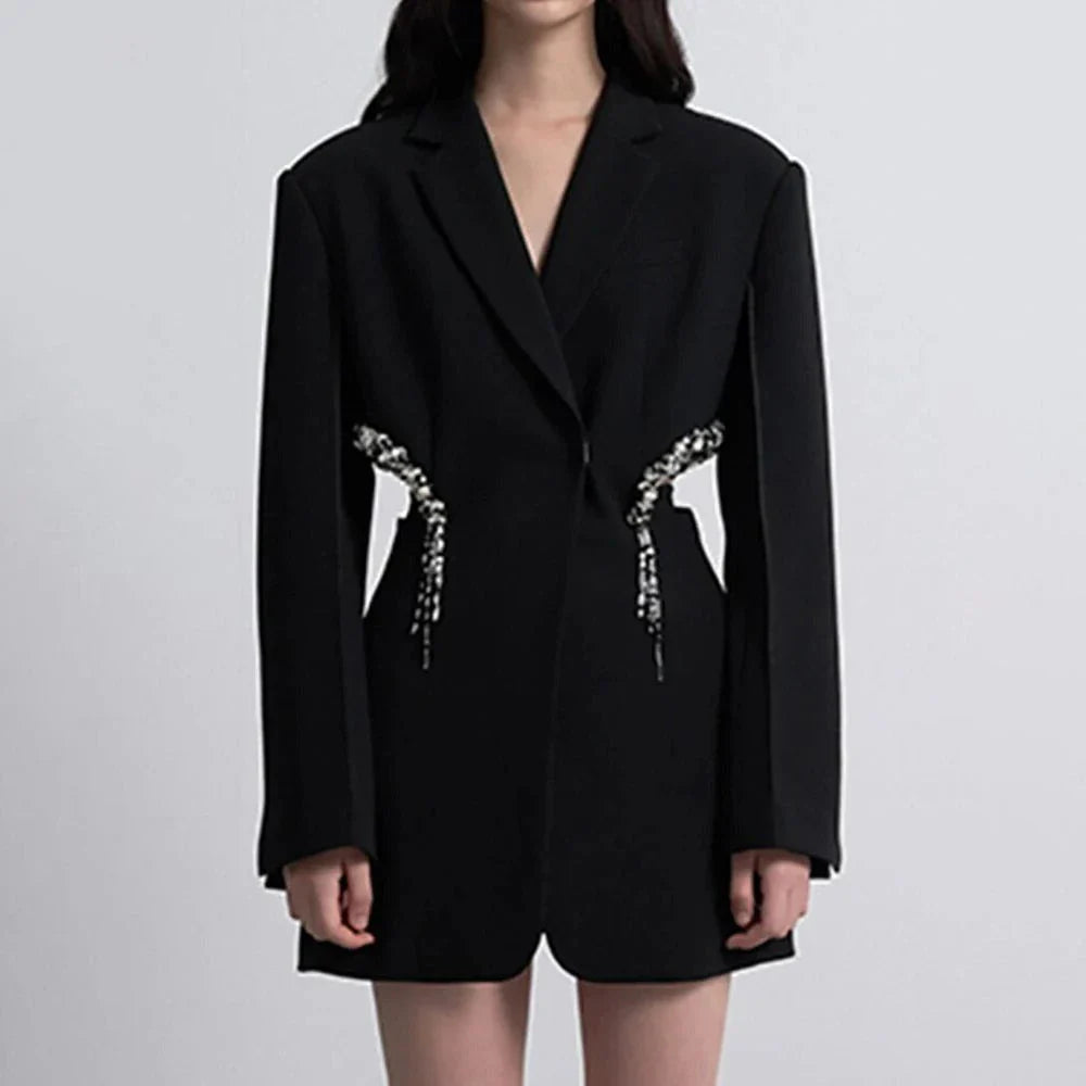 Elegant Hollow Out Crystal-Embellished Women's Blazer in Black, featuring a sleek notched collar, hidden breasted closure, and intricate hollow-out splicing with crystal embellishments.