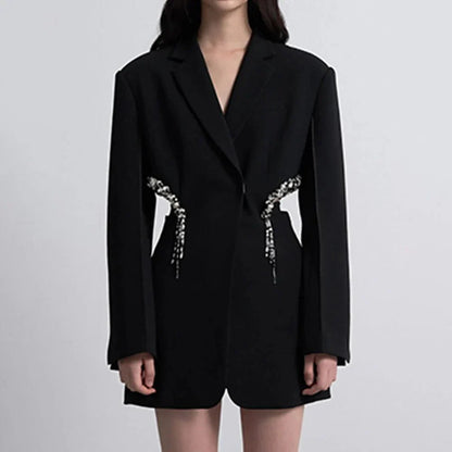 Elegant Hollow Out Crystal-Embellished Women's Blazer in Black, featuring a sleek notched collar, hidden breasted closure, and intricate hollow-out splicing with crystal embellishments.