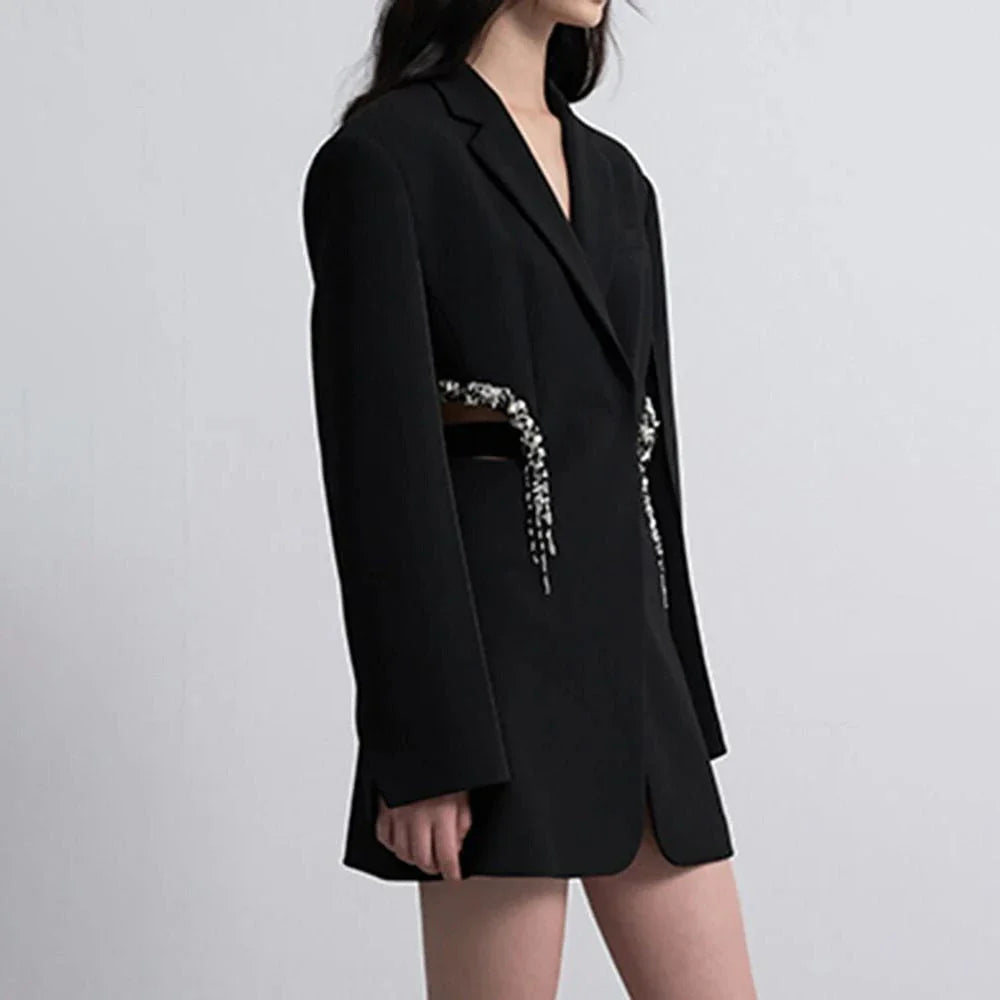 Elegant Hollow Out Crystal-Embellished Women's Blazer in Black, featuring a sleek notched collar, hidden breasted closure, and intricate hollow-out splicing with crystal embellishments.