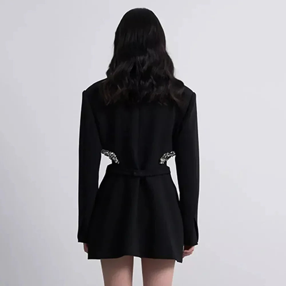 Elegant Hollow Out Crystal-Embellished Women's Blazer in Black, featuring a sleek notched collar, hidden breasted closure, and intricate hollow-out splicing with crystal embellishments.