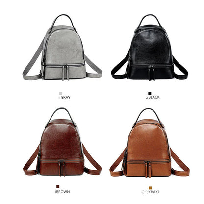 A stylish leather backpack in a variety of colours, featuring a classic oil-waxed cowhide design and practical storage compartments.