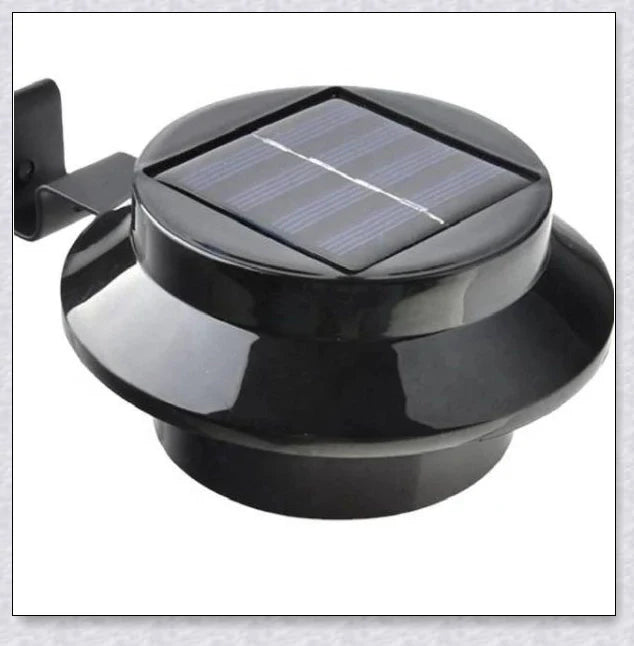 Premium solar-powered gutter lights illuminating an outdoor patio area at night
