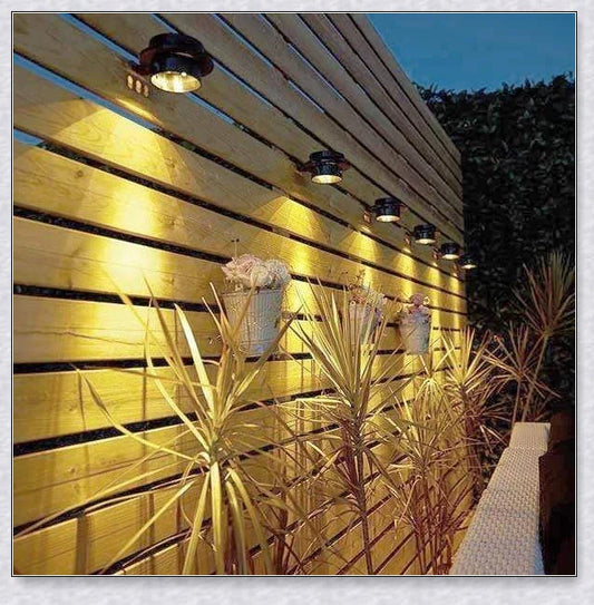 Premium solar-powered gutter lights illuminating an outdoor patio area at night
