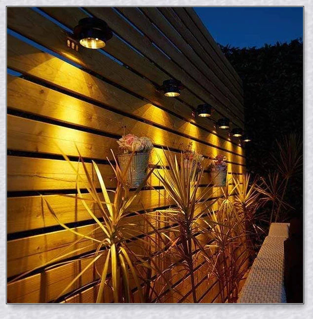 Premium solar-powered gutter lights illuminating an outdoor patio area at night