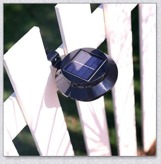Premium solar-powered gutter lights illuminating an outdoor patio area at night