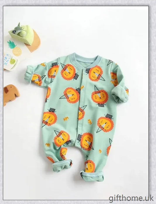 A cosy baby romper with charming cartoon designs, made from soft and breathable cotton fabric.