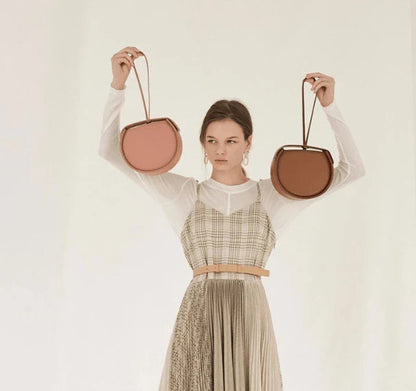 Stylish drawstring shoulder bag made with premium artificial leather for modern British lifestyle