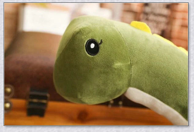 A plush Brachiosaurus dinosaur with a long neck, soft and cuddly body, and intricate details