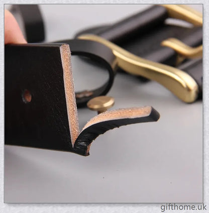 Premium leather men's belt with brass buckle and denim-inspired design, crafted in the UK for exceptional quality and style.
