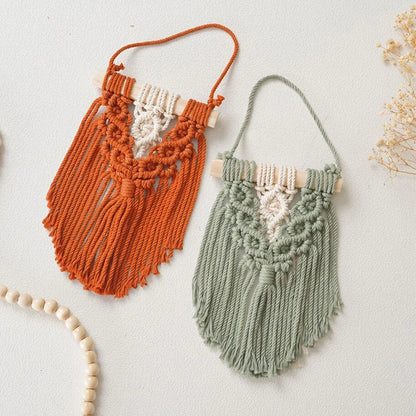 Handmade macrame wall hanging tapestry in creamy-white colour, featuring intricate patterns and natural textures