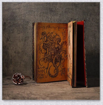 Aged Necronomicon prop with demonic face cover, perfect for dark fantasy decor