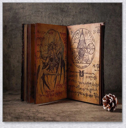 Aged Necronomicon prop with demonic face cover, perfect for dark fantasy decor