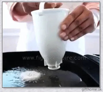 A white and stainless steel donut maker that can create full-size or mini donuts with ease