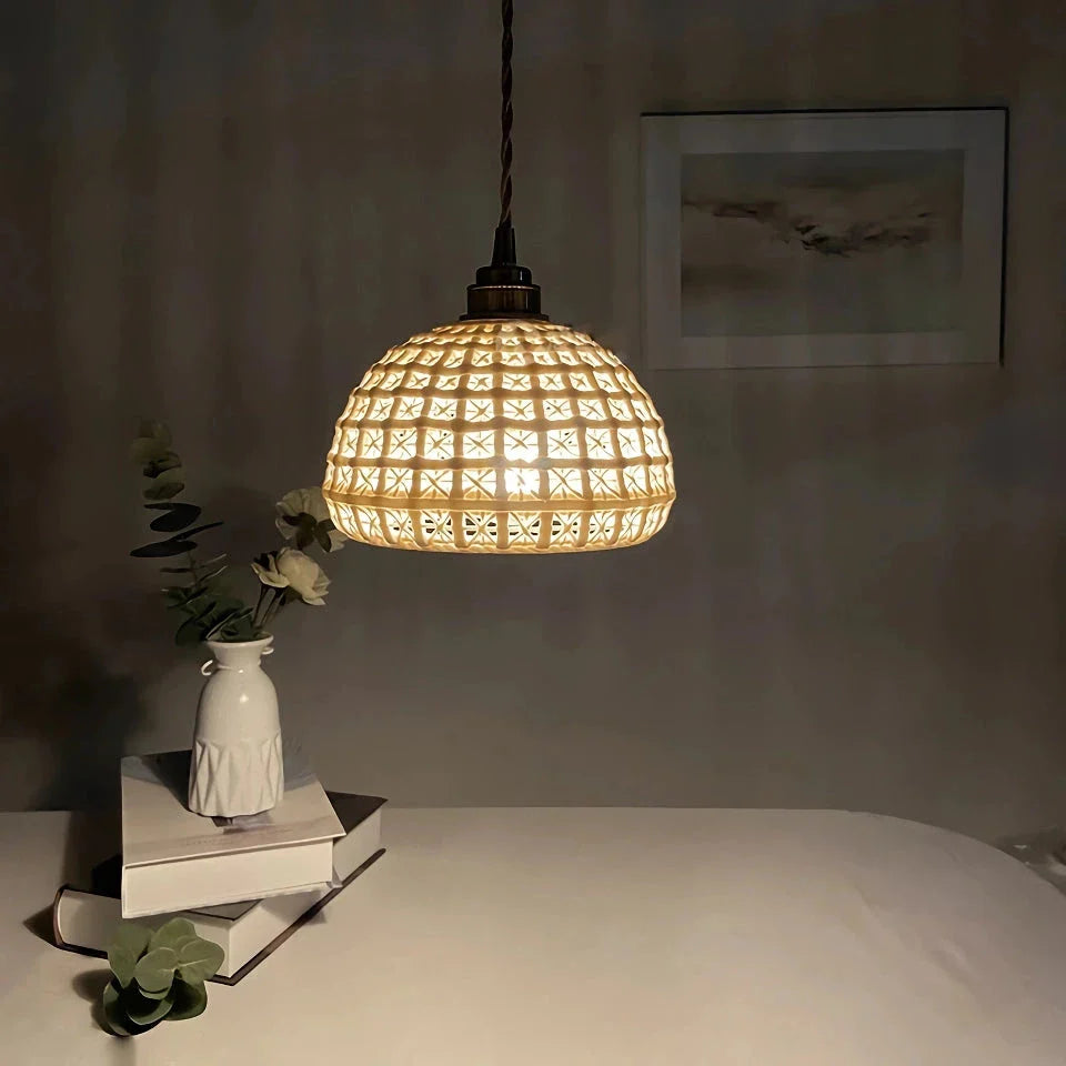 Modern LED ceramic pendant lights in a white finish, creating a warm and inviting ambiance in a living room.