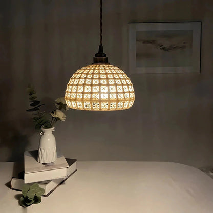 Modern LED ceramic pendant lights in a white finish, creating a warm and inviting ambiance in a living room.