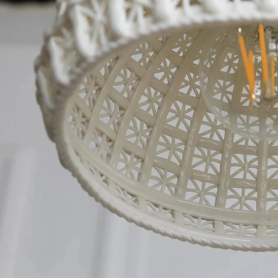 Modern LED ceramic pendant lights in a white finish, creating a warm and inviting ambiance in a living room.