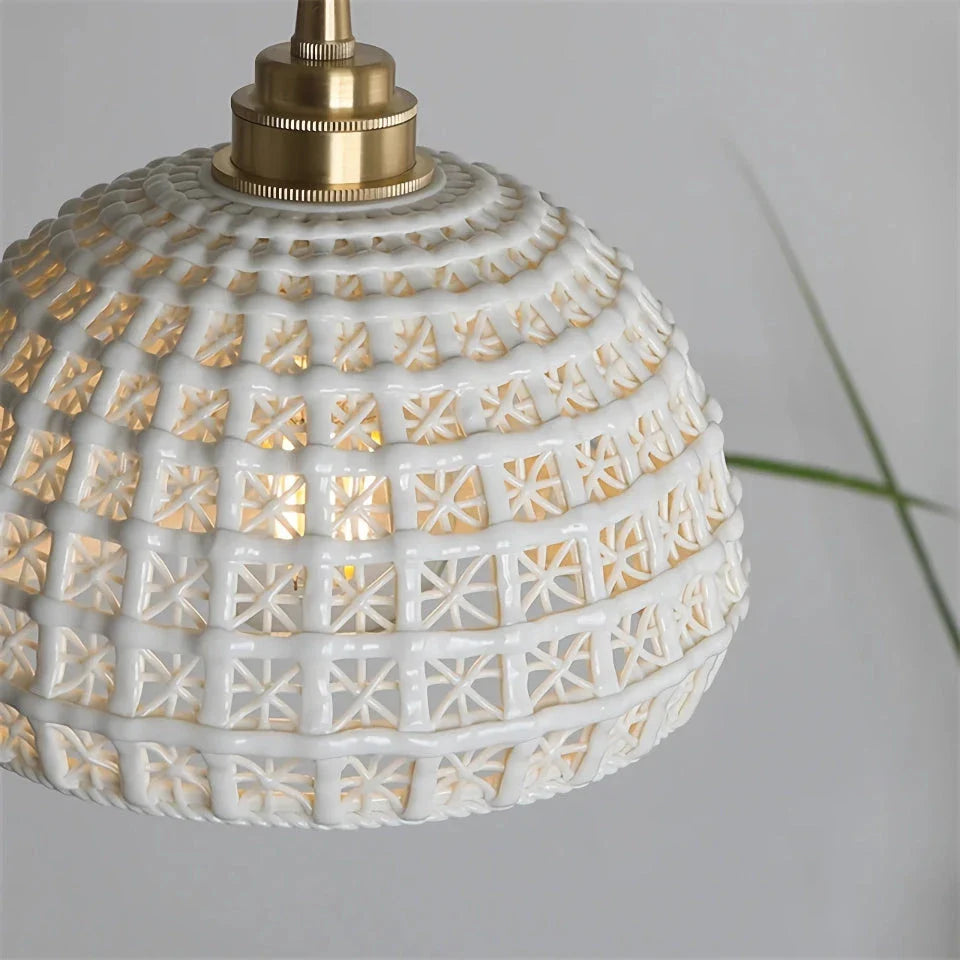 Modern LED ceramic pendant lights in a white finish, creating a warm and inviting ambiance in a living room.
