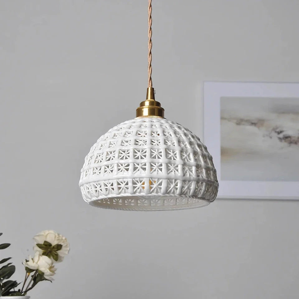 Modern LED ceramic pendant lights in a white finish, creating a warm and inviting ambiance in a living room.