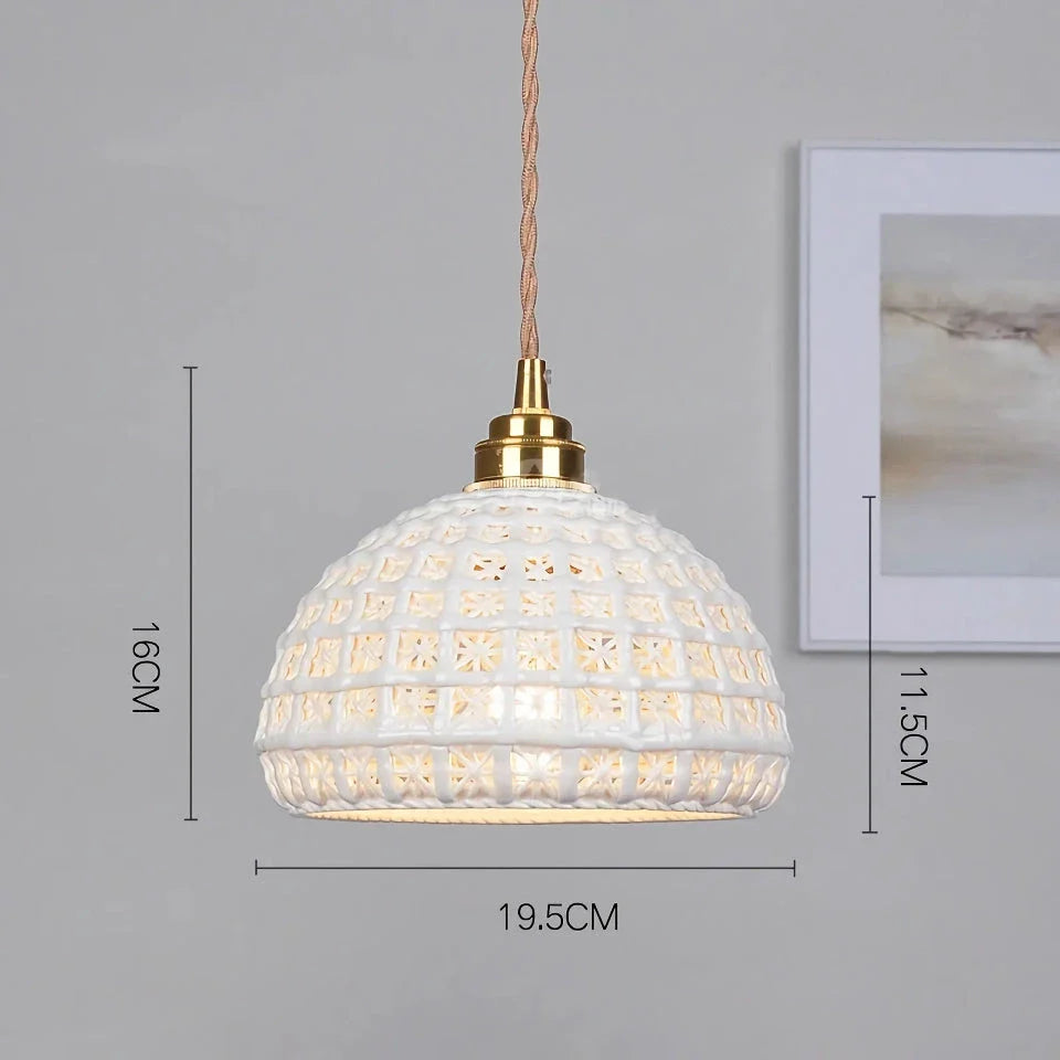 Modern LED ceramic pendant lights in a white finish, creating a warm and inviting ambiance in a living room.