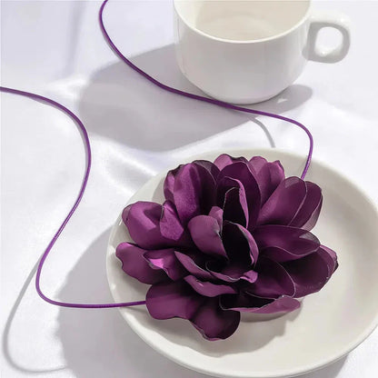 Exaggerated big rose flower choker necklace in black, red, blue, white, and purple colours