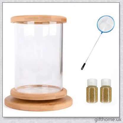 Glass Betta Fish Tank with Bamboo Base, a unique and visually striking aquarium that showcases your betta fish in a 360-degree rotating design.