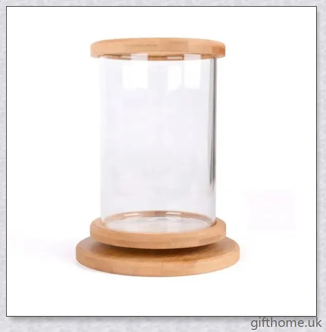 Glass Betta Fish Tank with Bamboo Base, a unique and visually striking aquarium that showcases your betta fish in a 360-degree rotating design.