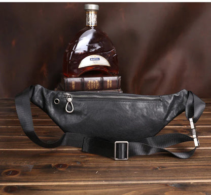 A premium black leather sports waist pack with multiple pockets and an adjustable strap for hands-free mobility and convenience.
