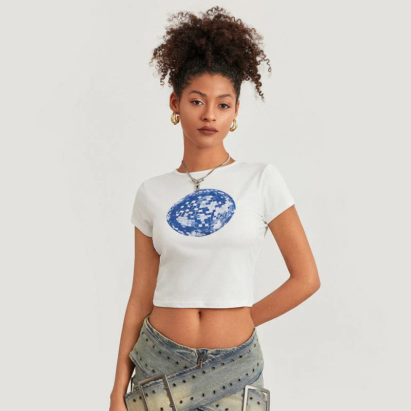 A vibrant t-shirt featuring a floral and disco ball print, perfect for summer festivals and casual outings.