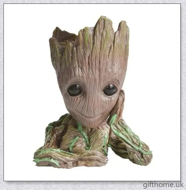 Decorative Groot-themed ceramic planter pot for displaying houseplants or organising desks